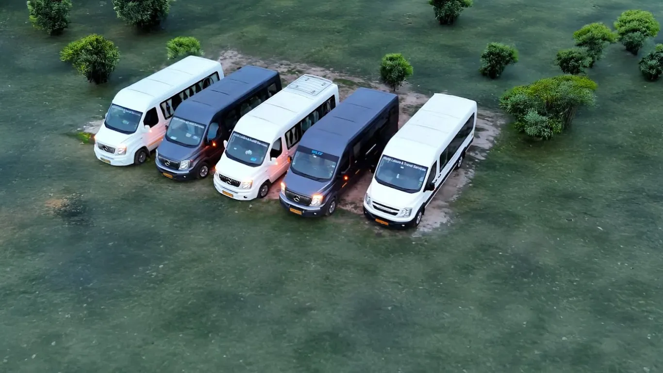 Urbania on the highway out of Chennai at golden hour — booking steps section